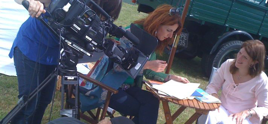 Katherine filming "Put Your Money Where Your Mouth" Is on location.
